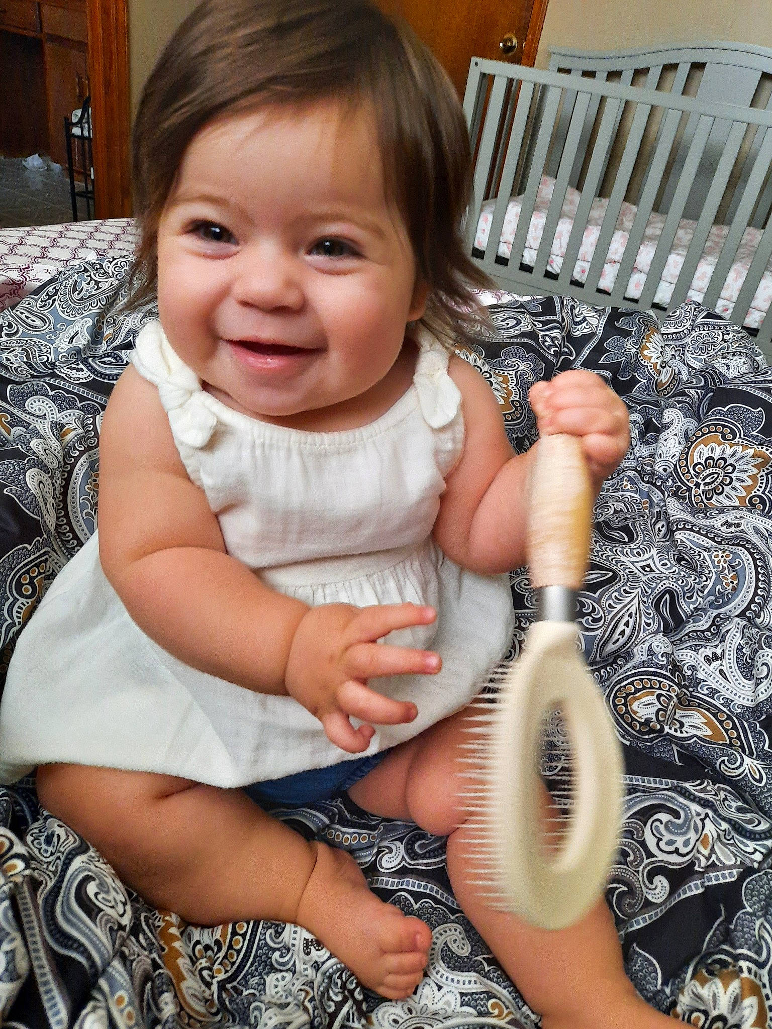 Railyn is registered to the contest to win money with this photo: baby, child, joy, leg, musical_instrument, person, play, sitting, skin, smile, toddler