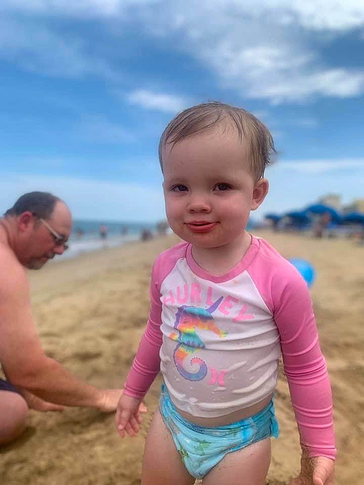 Clara joined the competition — help win amazing prizes! baby_toddler_clothing, beach, beauty, child, cloud, coast, fun, happy, head, joy, leisure, people_in_nature, people_on_beach, person, sand, shore, shorts, sky, smile, swimwear