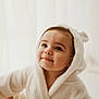 baby, child, hooded_robe, white_robe, smile, cute, soft_light, portrait, indoor, face, eyes, infant, warm, cozy, expression, toddler, adorable, skin, young_child, apparel