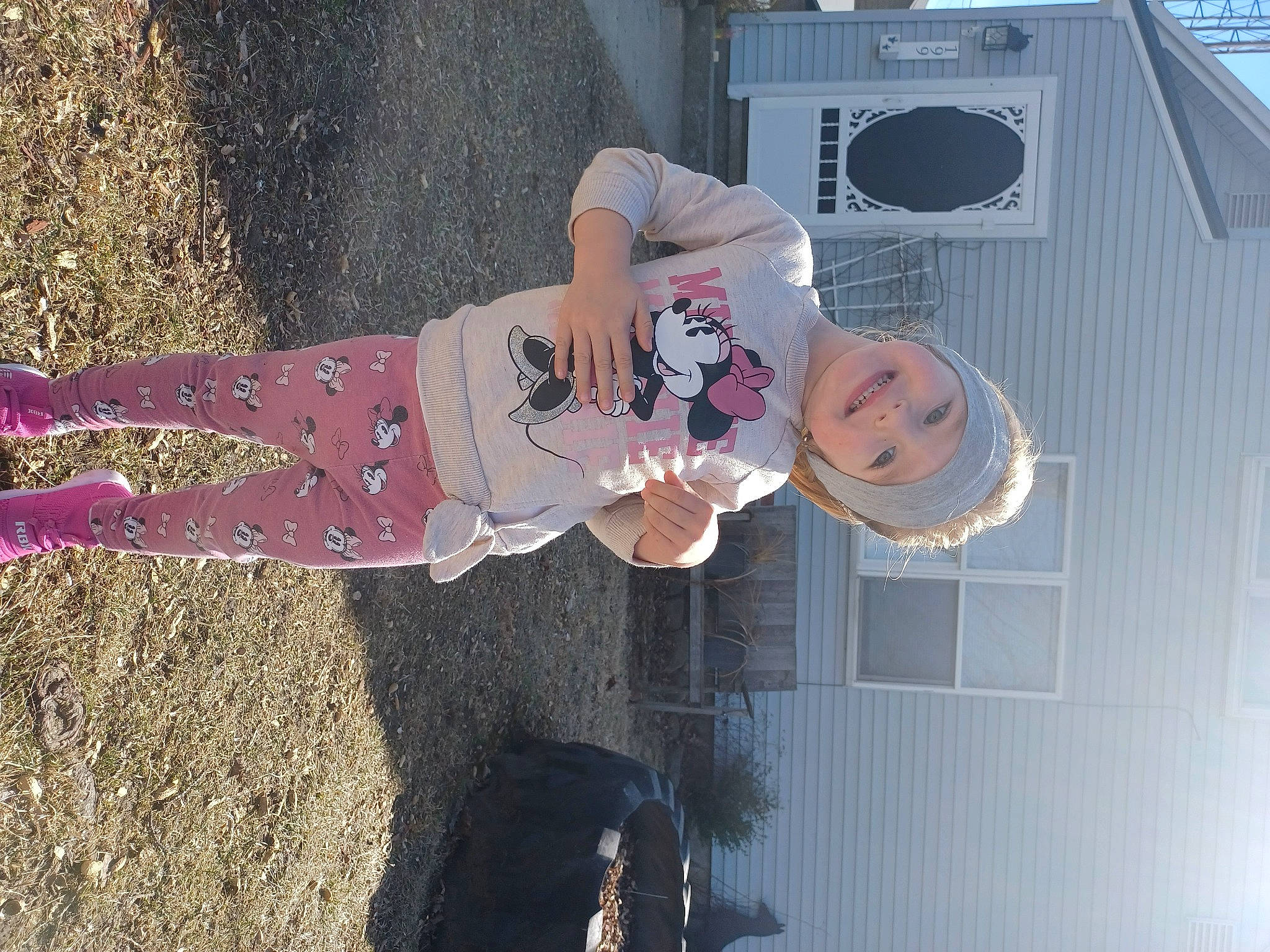 Peyton is registered to the contest to win money with this photo: audio_equipment, carmine, fun, hat, headwear, human_leg, joy, magenta, mechanical_fan, musical_instrument, person, plant, shadow, sidewalk, street_fashion, textile, thigh, tree