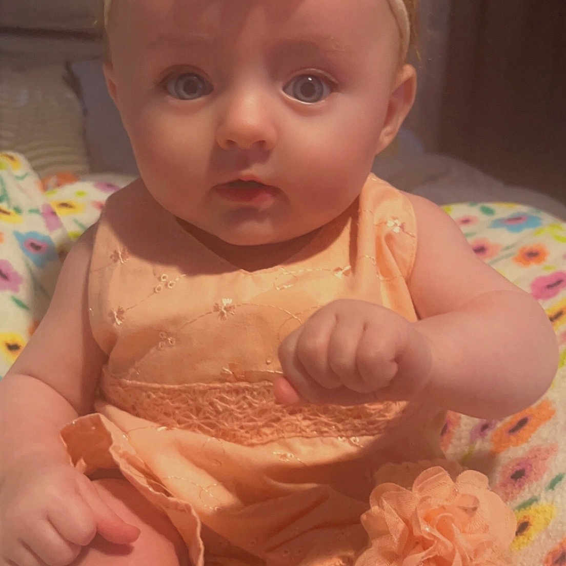 Maizy is registered to the contest to win money with this photo: accessories, baby, clothing, cushion, doll, dress, face, flower, hat, head, headband, homedecor, person, petal, photography, plant, portrait, rose, sitting, toy