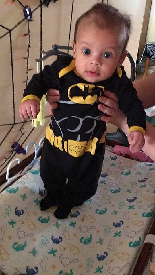 Kyden joined the competition — help win amazing prizes! arm, baby, batman, child, costume, person, play, toddler