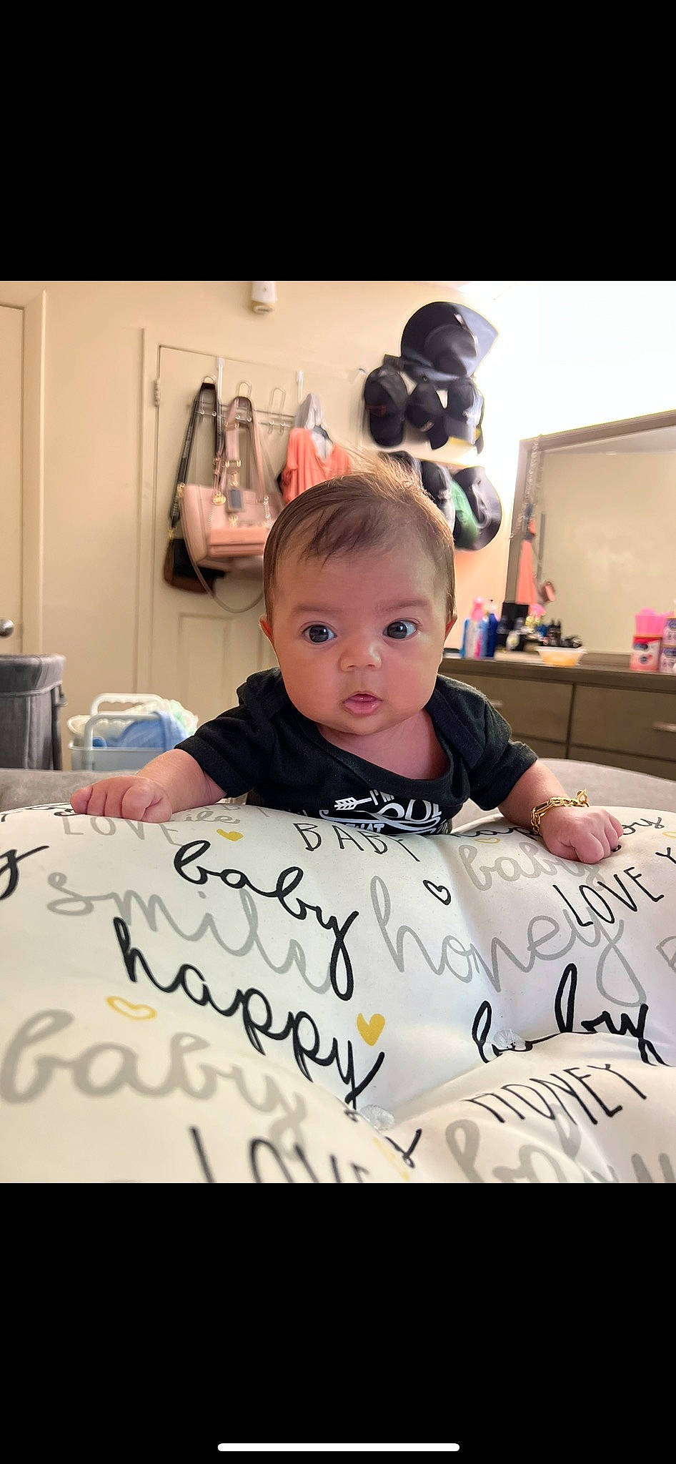 Izabella joined the competition — help win amazing prizes! baby, chair, child, event, face, flooring, font, handwriting, happy, person, photo_caption, room, sitting, t_shirt, table, toddler, writing, writing_instrument_accessory