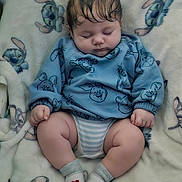 Elijah joined the competition — help win amazing prizes! baby, sleeping, blanket, blue_sweater, socks, love_mom, love_dad, cartoon_characters, cute, infant, cozy, child, peaceful, furniture, home, indoors, soft_lighting, hands, legs, cute_outfit