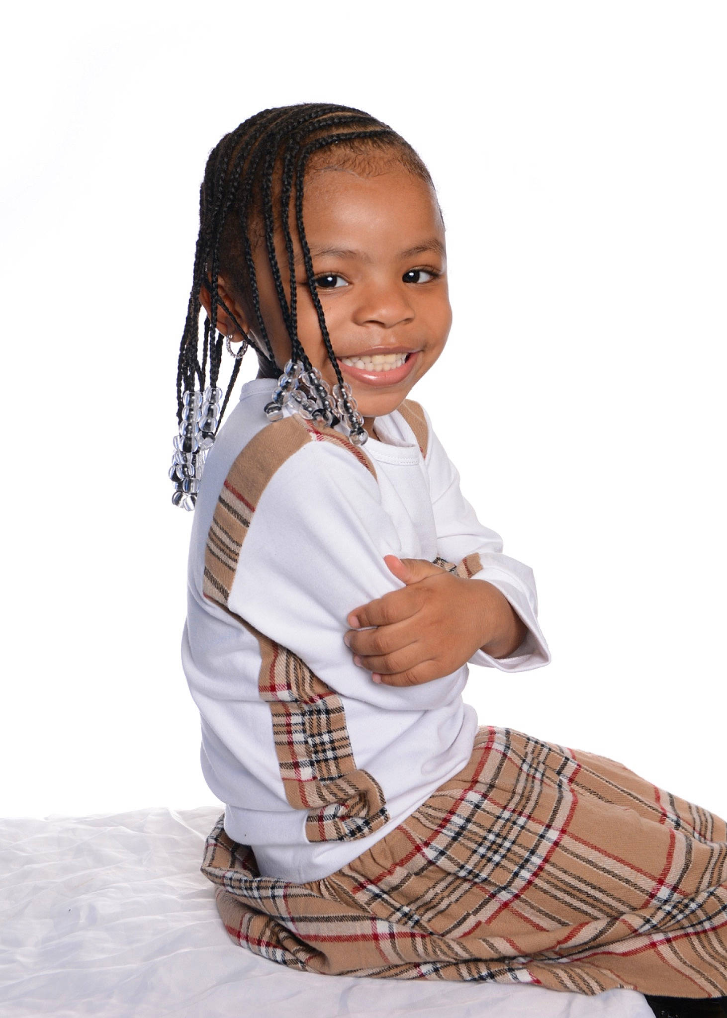 Samoraa joined the competition — help win amazing prizes! baby_toddler_clothing, black_hair, elbow, fashion_design, flash_photography, gesture, hair, happy, human_body, joy, long_hair, neck, pattern, person, plaid, sleeve, smile, tartan, thumb, toddler