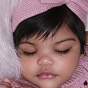 Remiyah is registered to the contest to win money with this photo: baby, bow, cheek, close_up, cozy, cute, dark_hair, eyebrows, face, fluffy_blanket, hand, infant, knit_sweater, lips, long_eyelashes, peaceful, pink_headband, portrait, sleeping, soft_texture