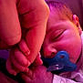 baby, sleeping, pacifier, hand, finger, closeup, infant, skin, cuddle, purple_light, newborn, peaceful, soft_lighting, person, portrait, sleep, cute, child, rest, clothing