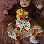 baby, infant, smiling, headband, bow, turkey, thanksgiving, outfit, skirt, socks, blanket, plush_rug, lying_down, portrait, holiday, cute, clothing, celebration, hands, baby_girl