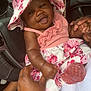 Malina is registered to the contest to win money with this photo: baby, child, smiling, pink, hat, floral, car_interior, seat, holding_hands, sparkly_shoes, beads, watch, person, cute, infant, happy, clothing, portrait, closeup, skin