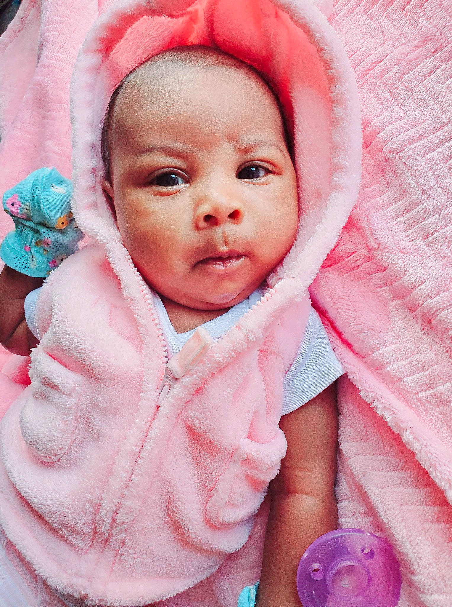 Amina is registered to the contest to win money with this photo: baby, baby_toddler_clothing, beauty, cheek, chin, happy, headwear, linens, lip, mouth, nose, organ, outerwear, person, pink, product, skin, sleeve, smile, textile