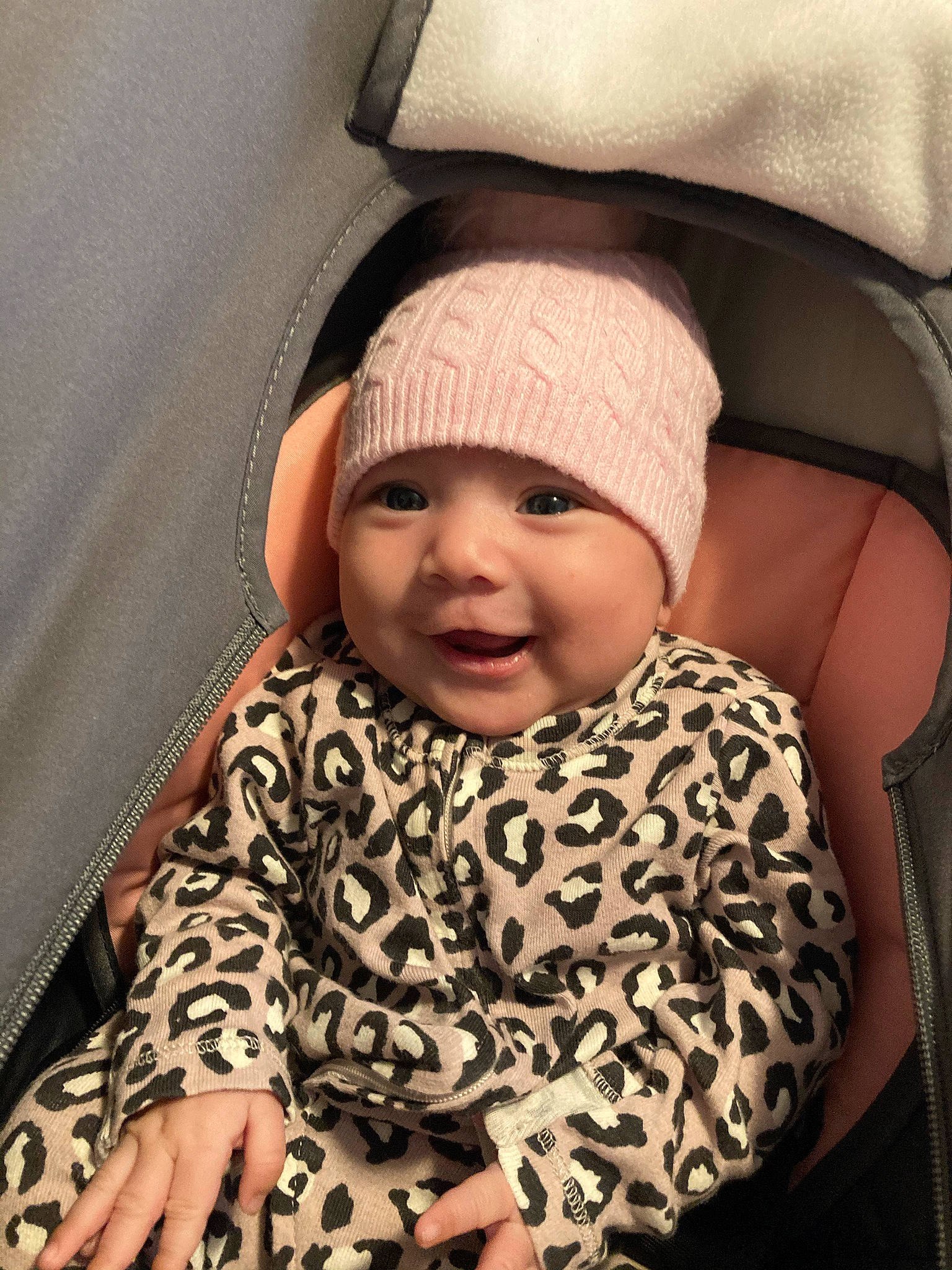 Brynn joined the competition — help win amazing prizes! baby, baby_sleeping, baby_toddler_clothing, beauty, cap, car_seat, child, comfort, cool, facial_expression, headgear, headwear, linens, mammal, outerwear, person, skin, sleeve, smile, textile