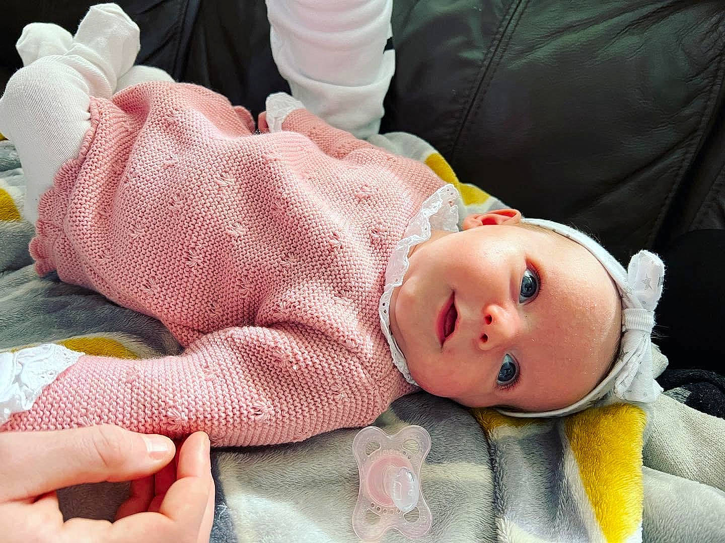 Maddison is registered to the contest to win money with this photo: baby, baby_products, baby_toddler_clothing, cheek, child, comfort, eye, eyelash, finger, linens, lip, mouth, nail, nose, person, pink, skin, sleeve, textile, thumb