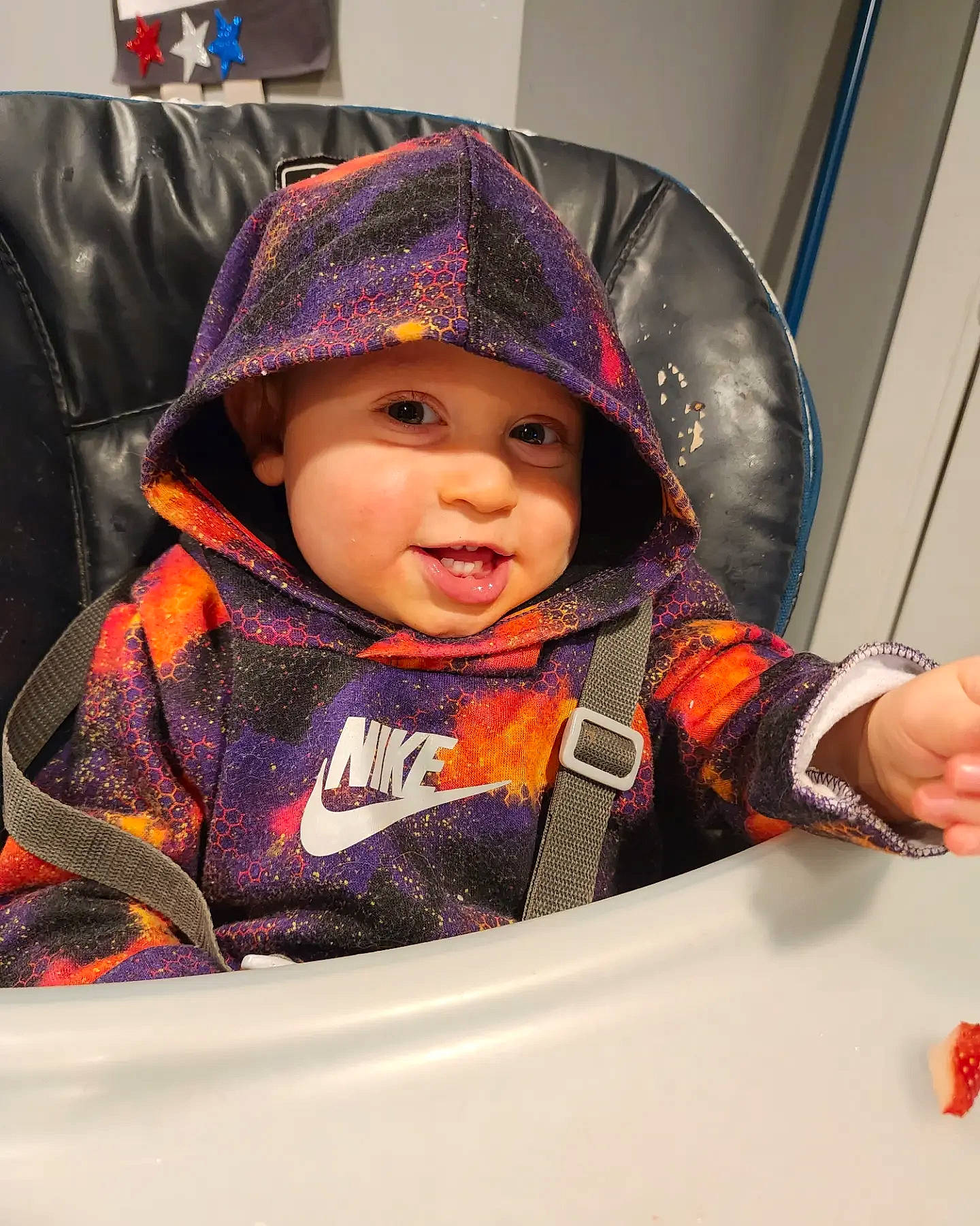 Jesse is registered to the contest to win money with this photo: baby, baby_laughing, baby_toddler_clothing, beanie, cap, cheek, child, comfort, fashion_accessory, fun, happy, headwear, hoodie, magenta, pattern, person, personal_protective_equipment, purple, sitting, sleeve