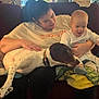 Willow Mae joined the competition — help win amazing prizes! baby, blanket, casual_clothing, collar, comfort, couch, dog, family, happy, home, indoor, interaction, light, pet, playful, relaxing, seated, smiling, window, woman