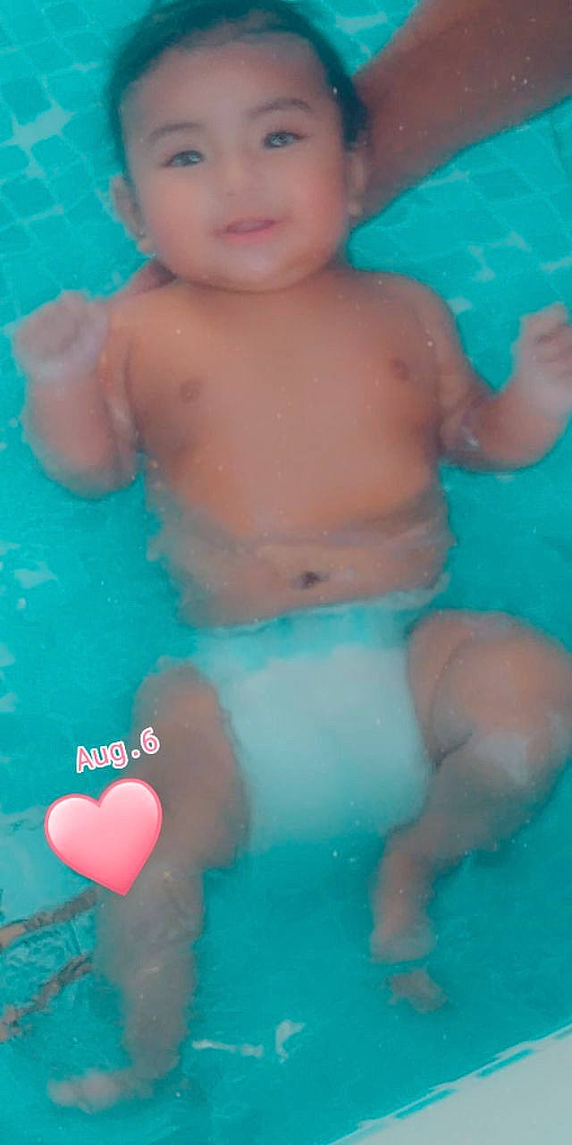 Gia is registered to the contest to win money with this photo: aqua, arm, azure, bathing, blue, chest, face, fluid, happy, human_body, leisure, muscle, organ, person, photograph, product, skin, smile, swimming_pool, water