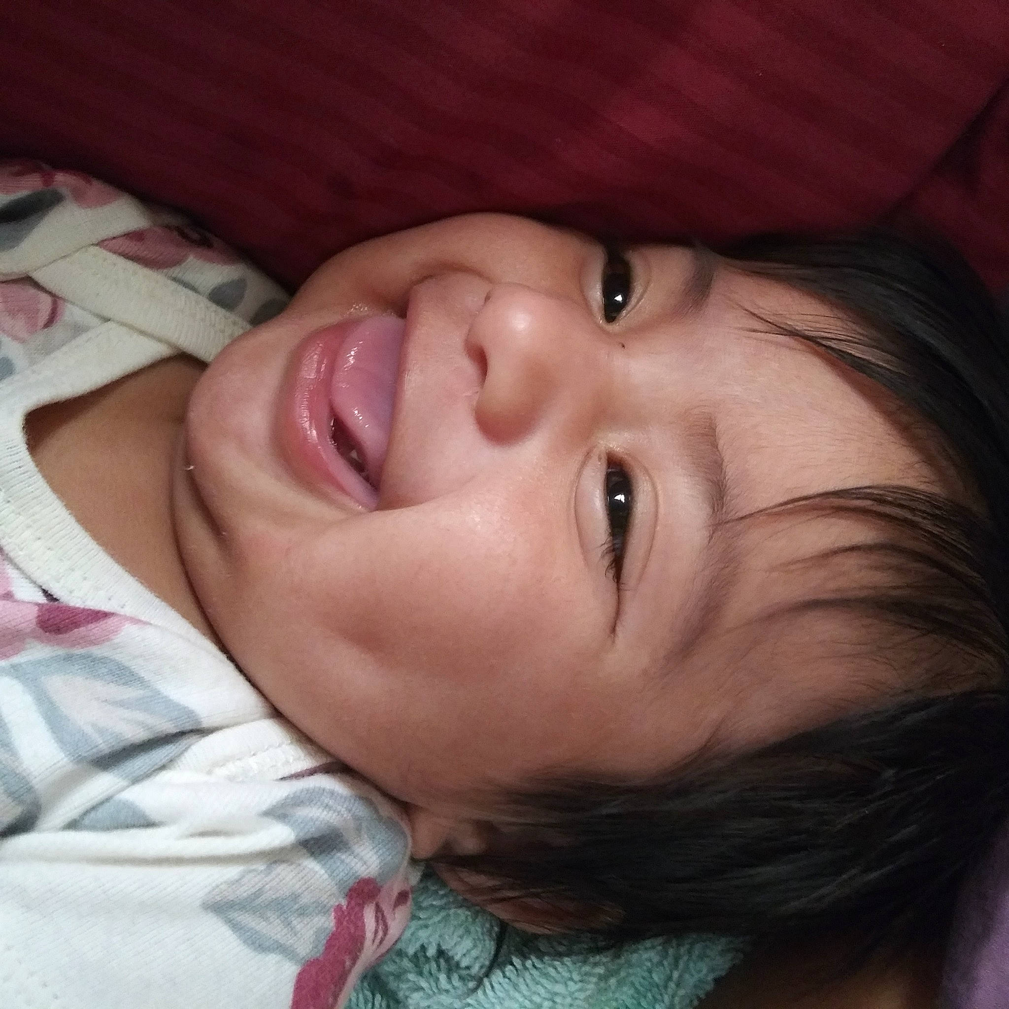 Gia is registered to the contest to win money with this photo: baby, cheek, close_up, ear, eyebrow, eyelash, flash_photography, forehead, happy, human_body, iris, jaw, lip, mouth, nose, person, plant, skin, smile, toddler