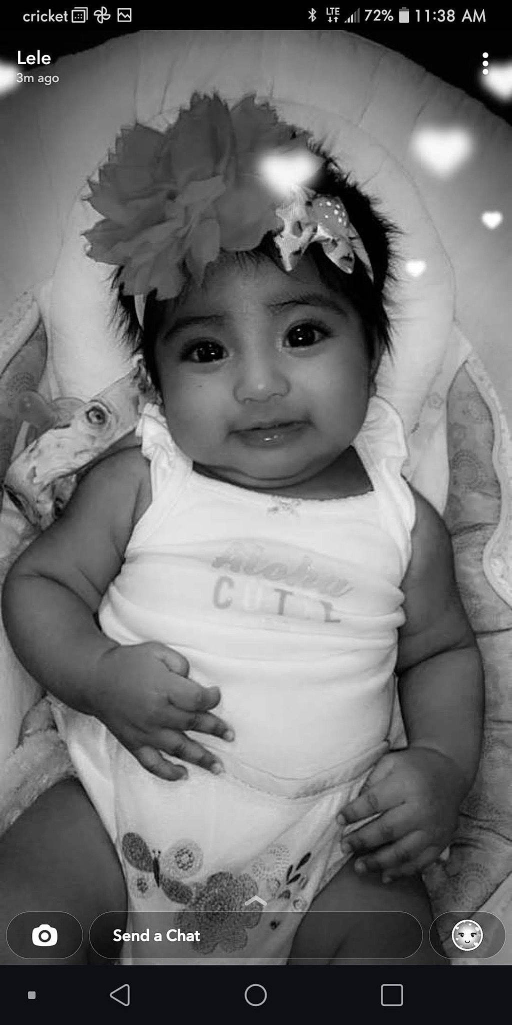 Gia is registered to the contest to win money with this photo: arm, baby_toddler_clothing, black, black_and_white, cheek, eyebrow, eyelash, finger, flash_photography, gesture, hairstyle, hand, happy, headwear, human_body, iris, lip, person, skin, style