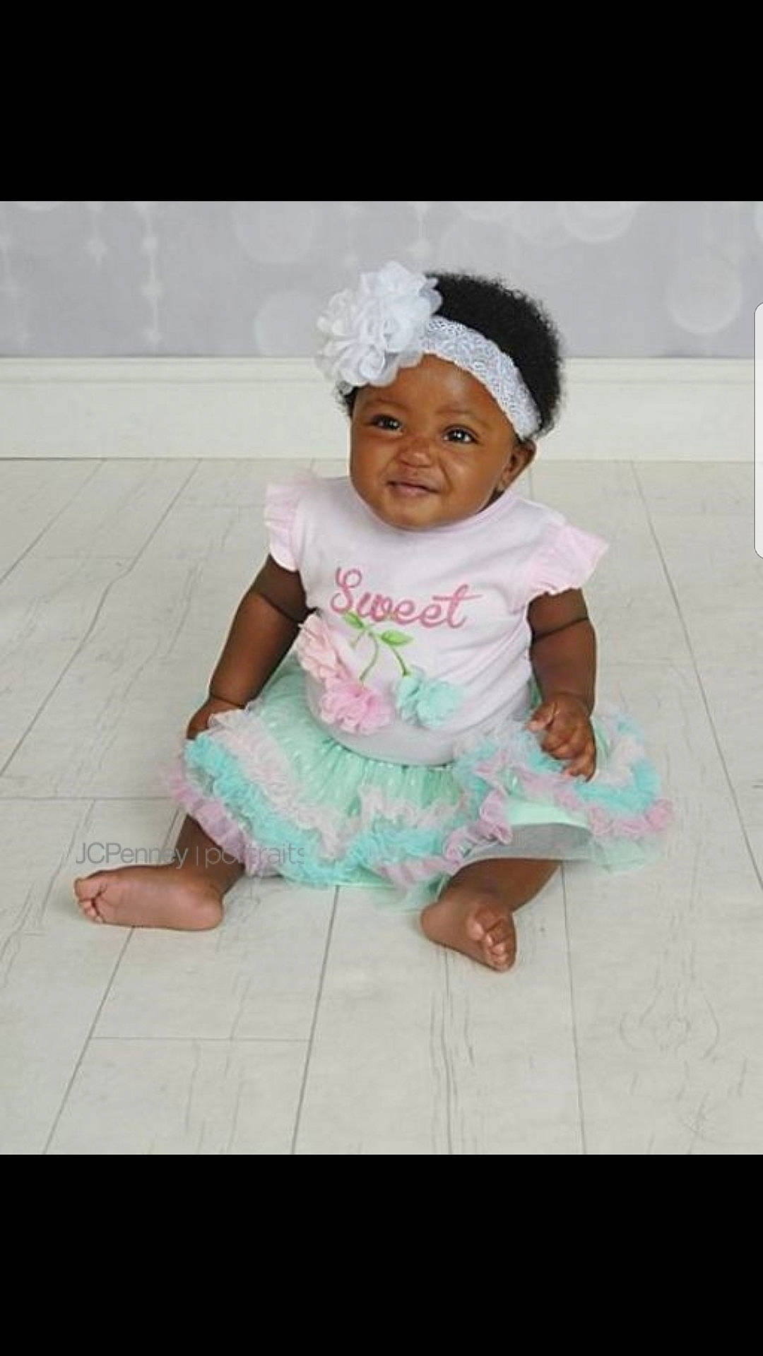 Aurora joined the competition — help win amazing prizes! cap, child, day, flooring, fun, girl, hair_accessory, headgear, headwear, infant, joy, material, person, pink, product, sitting, skin, smile, textile, toddler