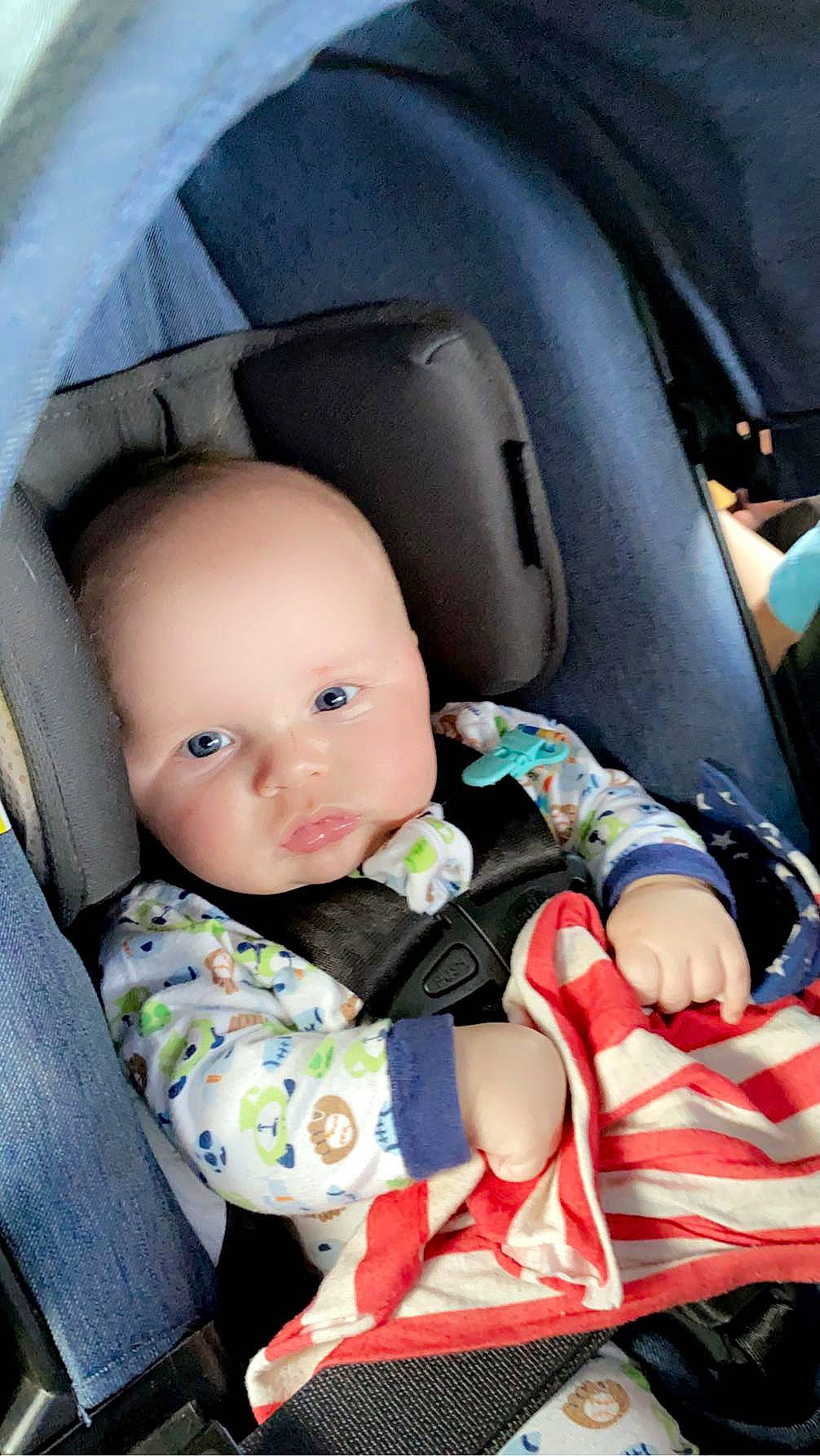 Zayne is registered to the contest to win money with this photo: auto_part, baby, baby_carriage, baby_in_car_seat, baby_products, baby_safety, baby_toddler_clothing, car_seat, car_seat_cover, carmine, cheek, child, comfort, family_car, fun, head_restraint, person, seat_belt, sitting, toddler