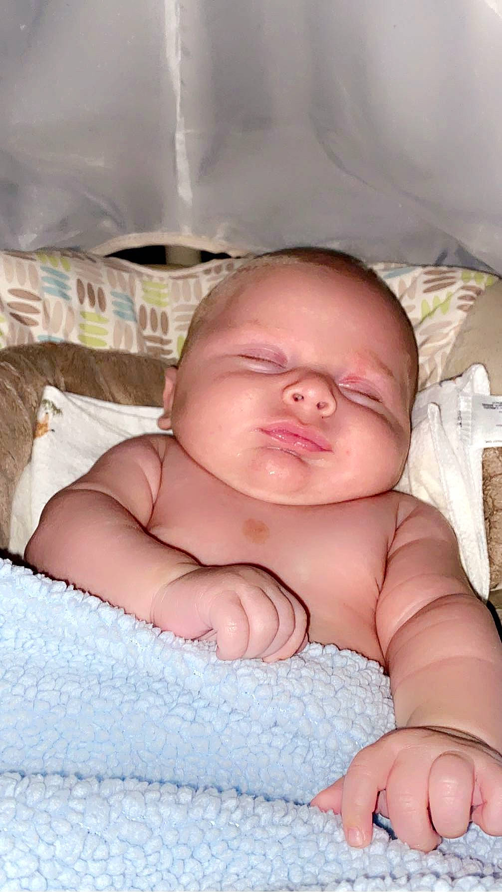 Zayne is registered to the contest to win money with this photo: abdomen, baby, baby_sleeping, baby_toddler_clothing, cheek, chest, chin, comfort, eyebrow, eyelash, finger, linens, mouth, nose, person, pink, skin, stomach, thumb, toddler