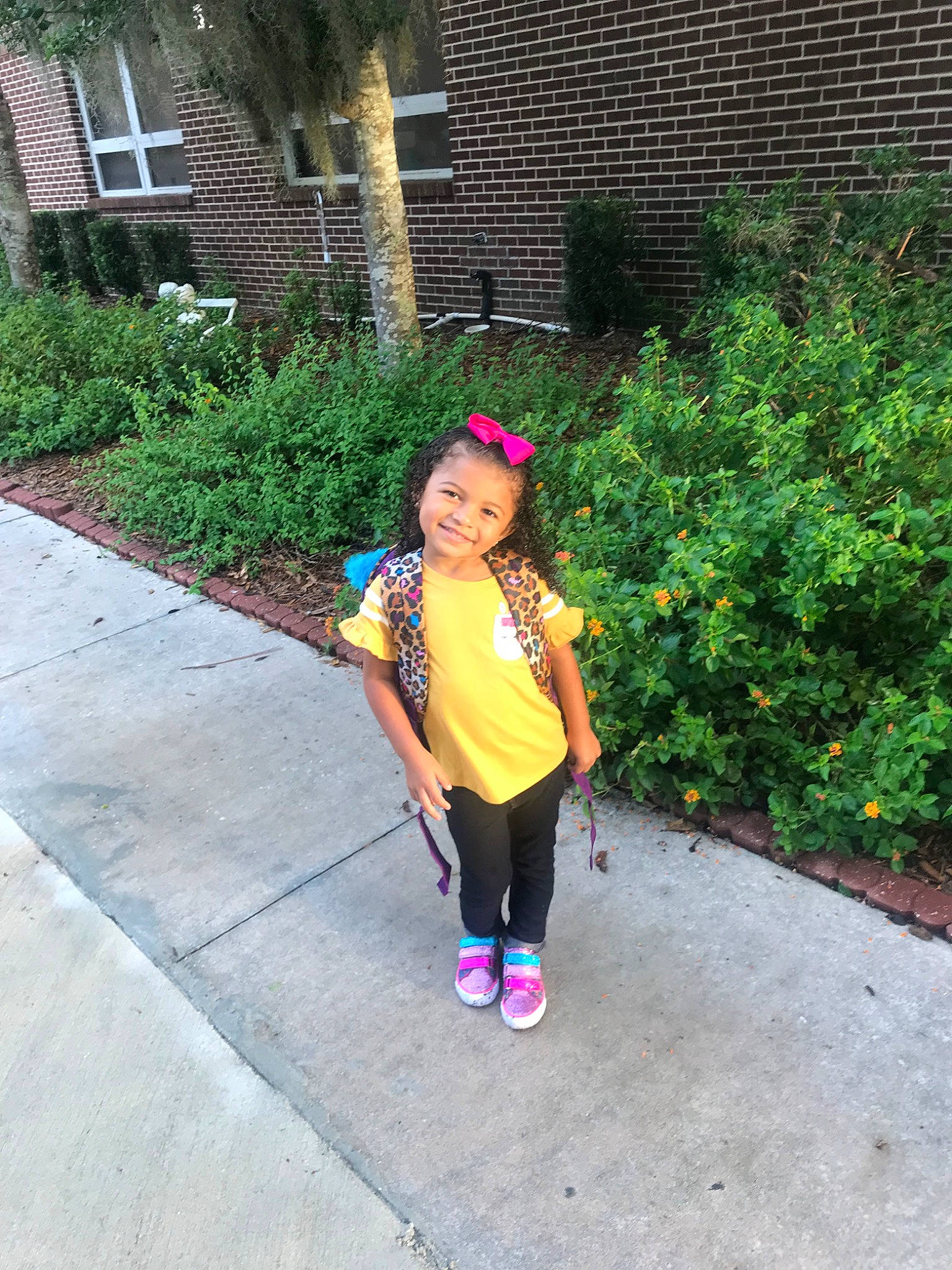 Khloe joined the competition — help win amazing prizes! child, flower, footwear, garden, grass, joy, leaf, leisure, person, pink, plant, play, recreation, shoe, sidewalk, snapshot, summer, toddler, tree, vacation