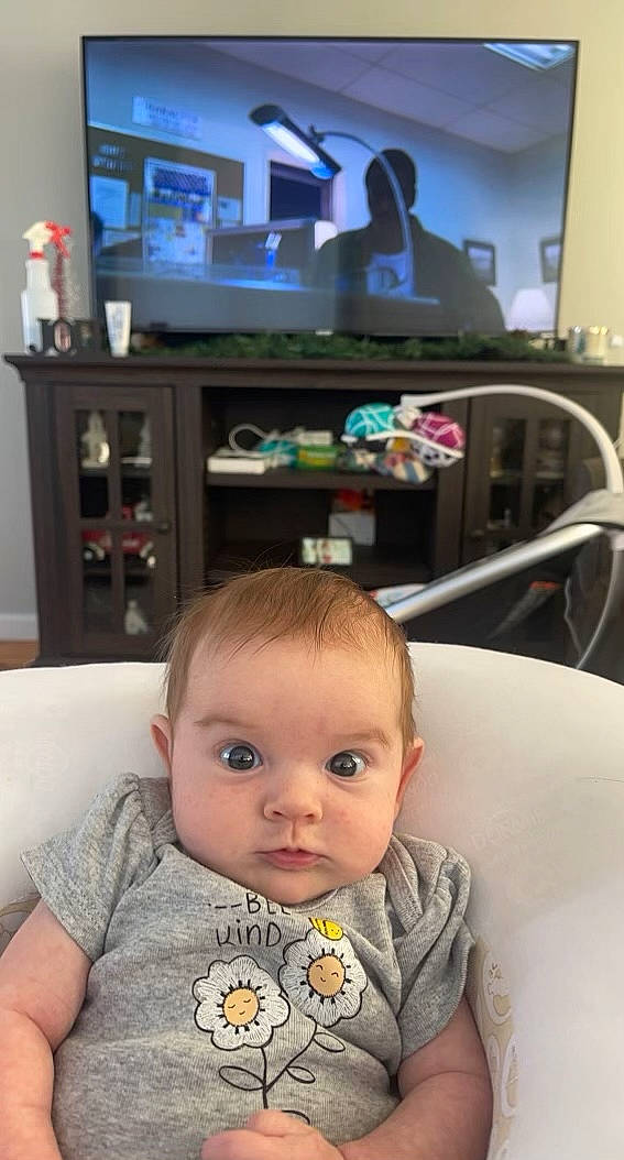 Aspen joined the competition — help win amazing prizes! baby, baby_products, baby_safety, baby_toddler_clothing, bib, chair, cheek, child, eyebrow, fun, iris, person, picture_frame, room, shelf, sitting, skin, television, toddler, vacation