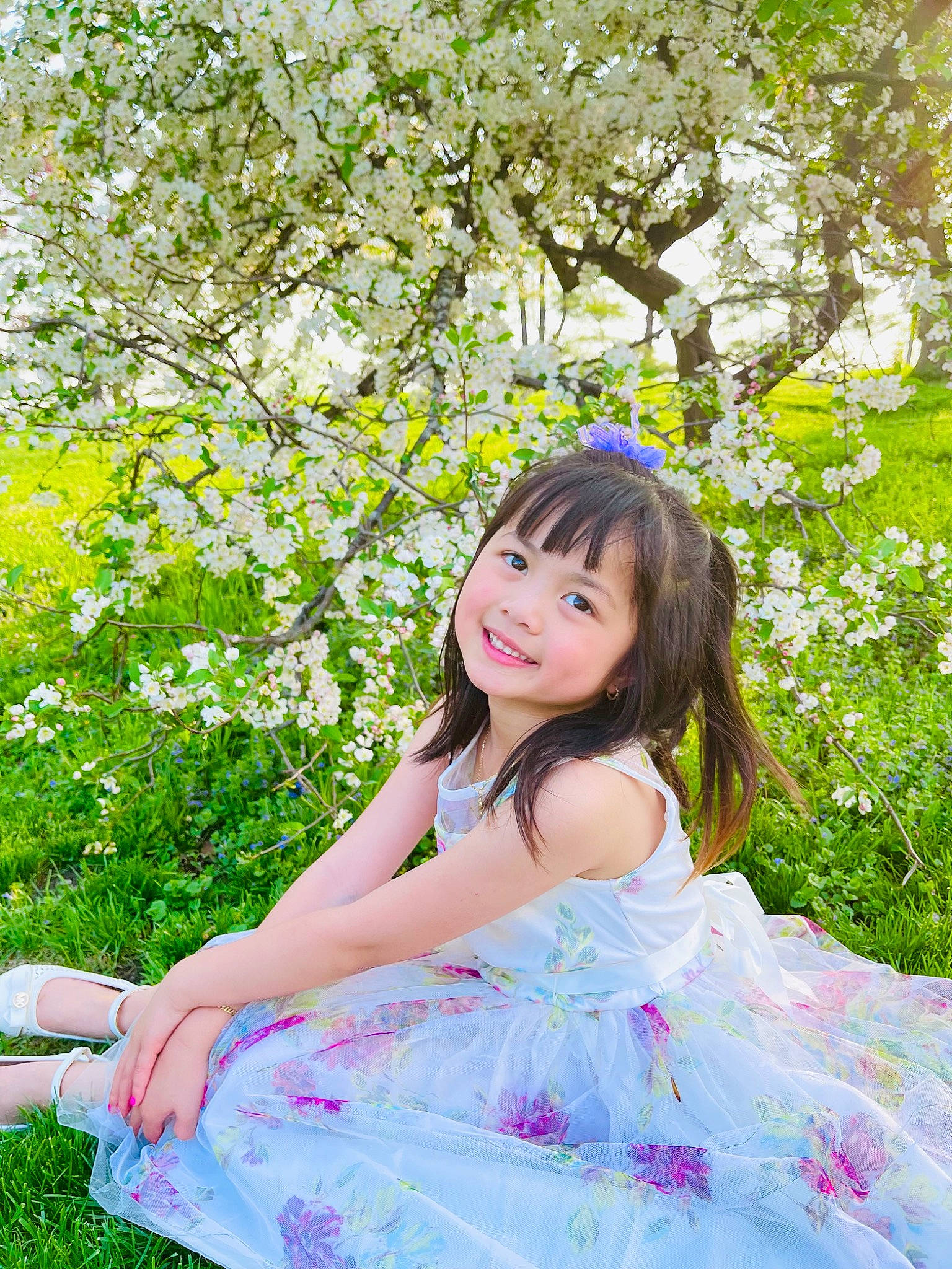 Lauren Tran is registered to the contest to win money with this photo: child, event, face, flash_photography, flower, formal_wear, fun, grass, happy, joy, leisure, magenta, nature, people_in_nature, person, plant, recreation, ruffle, smile, spring