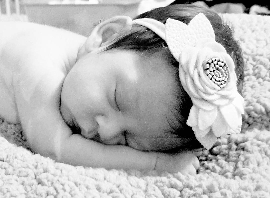 Tinley is registered to the contest to win money with this photo: baby, baby_sleeping, bedtime, birth, black_and_white, child, fashion_accessory, hair_accessory, headband, headgear, nap, person, photograph, photography, portrait_photography, sleep, white