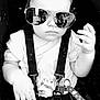 Freÿja a rejoint le concours — aidez-le/la à gagner de superbes lots ! baby, child, sunglasses, stroller, seatbelt, keychain, unicorn, clothing, hands, black_and_white, portrait, serious, cute, closeup, infant, fashion, accessories, person, seat, young