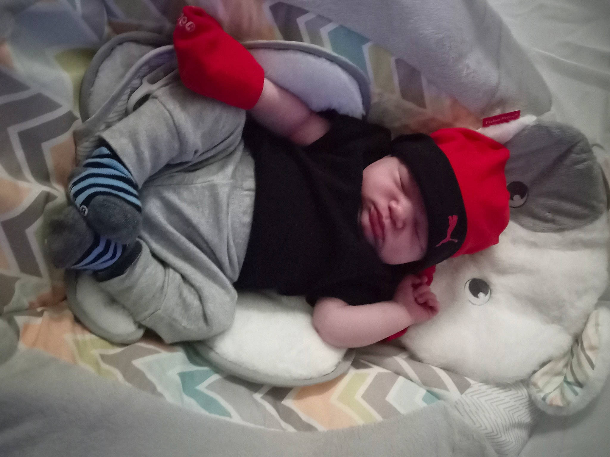 Caiden joined the competition — help win amazing prizes! baby, baby_products, baby_sleeping, baby_toddler_clothing, bedtime, carmine, child, comfort, face, headwear, linens, mammal, nap, person, room, sitting, sleeve, textile, toddler, vertebrate