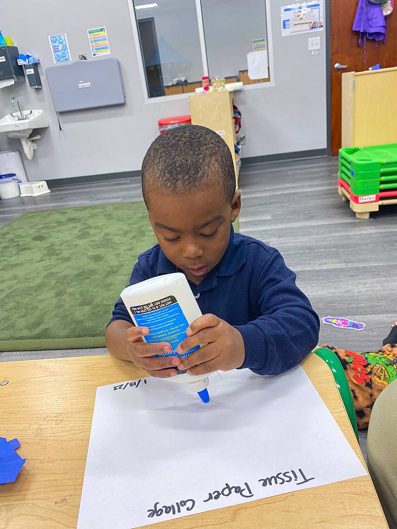 Isaiah joined the competition — help win amazing prizes! chair, child, desk, education, engineering, flooring, fun, green, job, learning, leisure, person, play, reading, room, sharing, t_shirt, table, toddler, writing