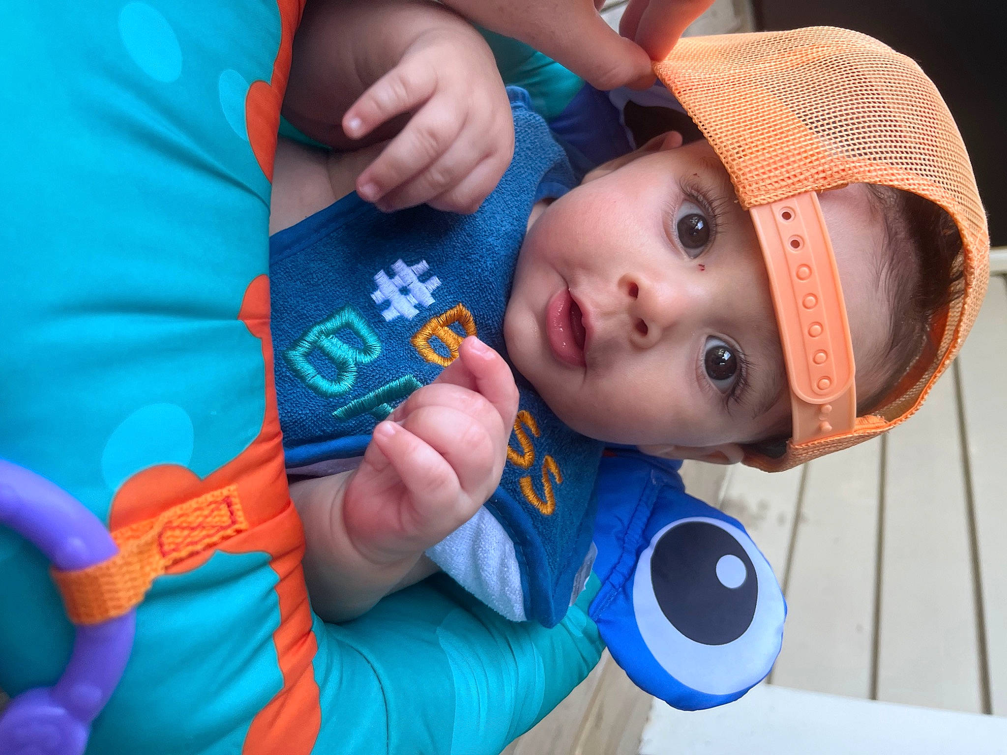 Kyson is registered to the contest to win money with this photo: arm, baby, baby_products, baby_toddler_clothing, cap, child, electric_blue, fashion_accessory, finger, fun, gesture, hand, happy, hat, headwear, leisure, nose, person, personal_protective_equipment, skin