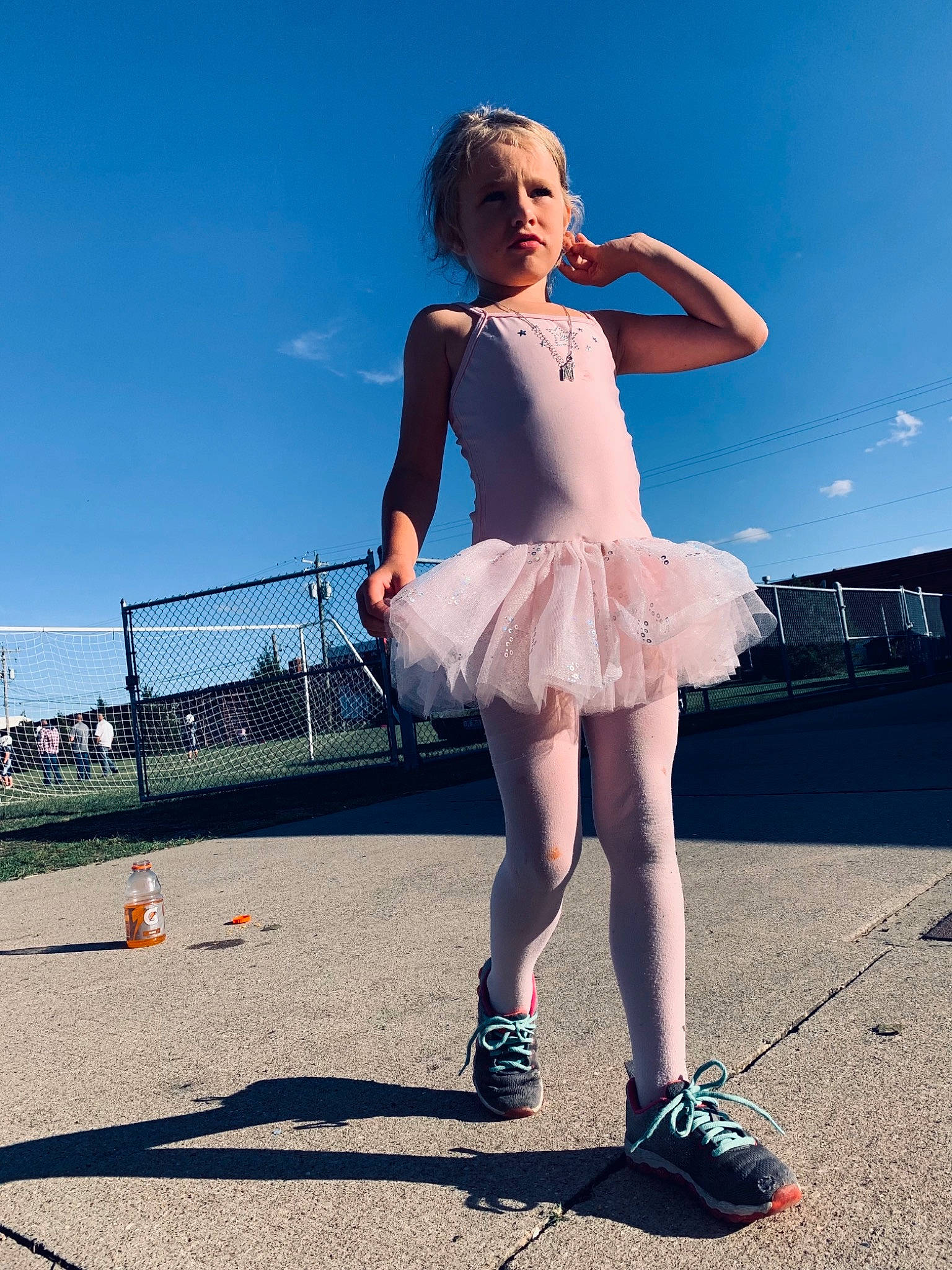 Maelynn is registered to the contest to win money with this photo: azure, eyewear, fashion_design, flash_photography, fun, hairstyle, happy, human, knee, leisure, people_in_nature, person, shoe, shoulder, sky, sneakers, standing, street_fashion, thigh, travel