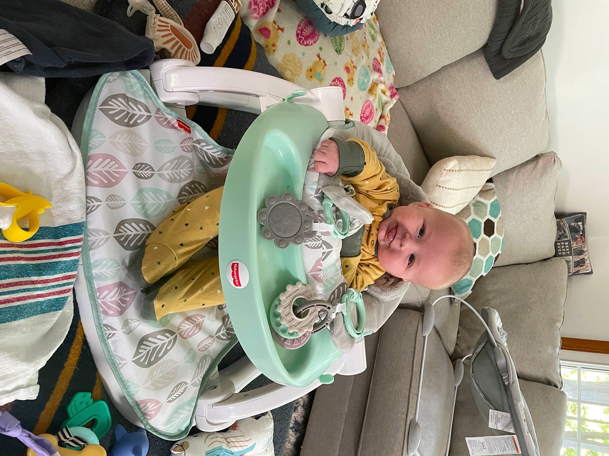 Gage is registered to the contest to win money with this photo: art, child, circle, eyewear, fashion_accessory, fun, hat, headgear, joy, pattern, person, personal_protective_equipment, plastic, room, sandal, sun_hat, textile, toddler, visual_arts