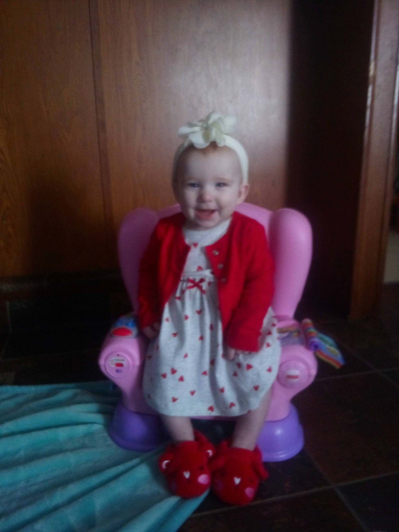 Everley Murphy is registered to the contest to win money with this photo: baby_toddler_clothing, child, fashion_accessory, flash_photography, flooring, fun, happy, headpiece, jewellery, joy, magenta, necklace, pattern, person, pink, purple, room, sitting, sleeve, smile