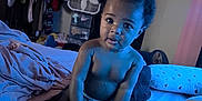 Icylinn joined the competition — help win amazing prizes! baby, child, bed, blanket, blue_light, clothing, fan, furniture, indoor, person, portrait, room, sitting, toy, toddler, wall, window_curtain, fuzzy_blanket, face, hair