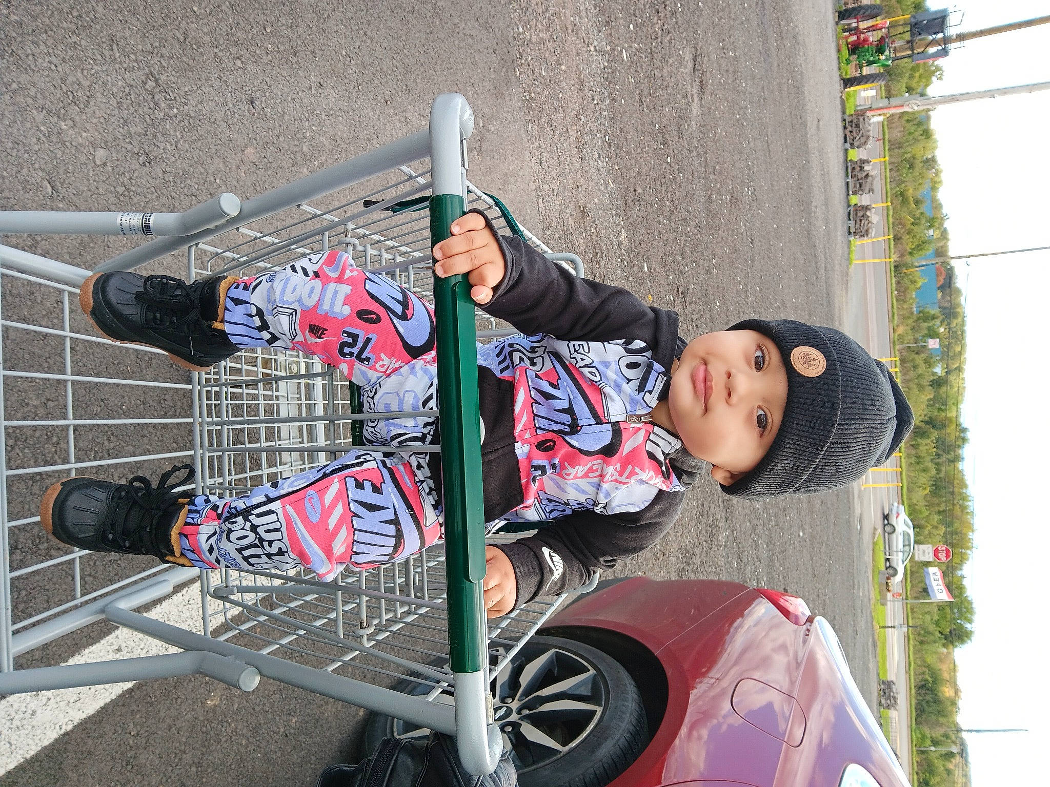 Jaziah joined the competition — help win amazing prizes! automotive_exterior, automotive_tire, automotive_wheel_system, baby_products, bicycle_accessory, bicycle_tire, child, fun, hat, headwear, helmet, motor_vehicle, person, recreation, rolling, sitting, sky, tire, toddler, tree