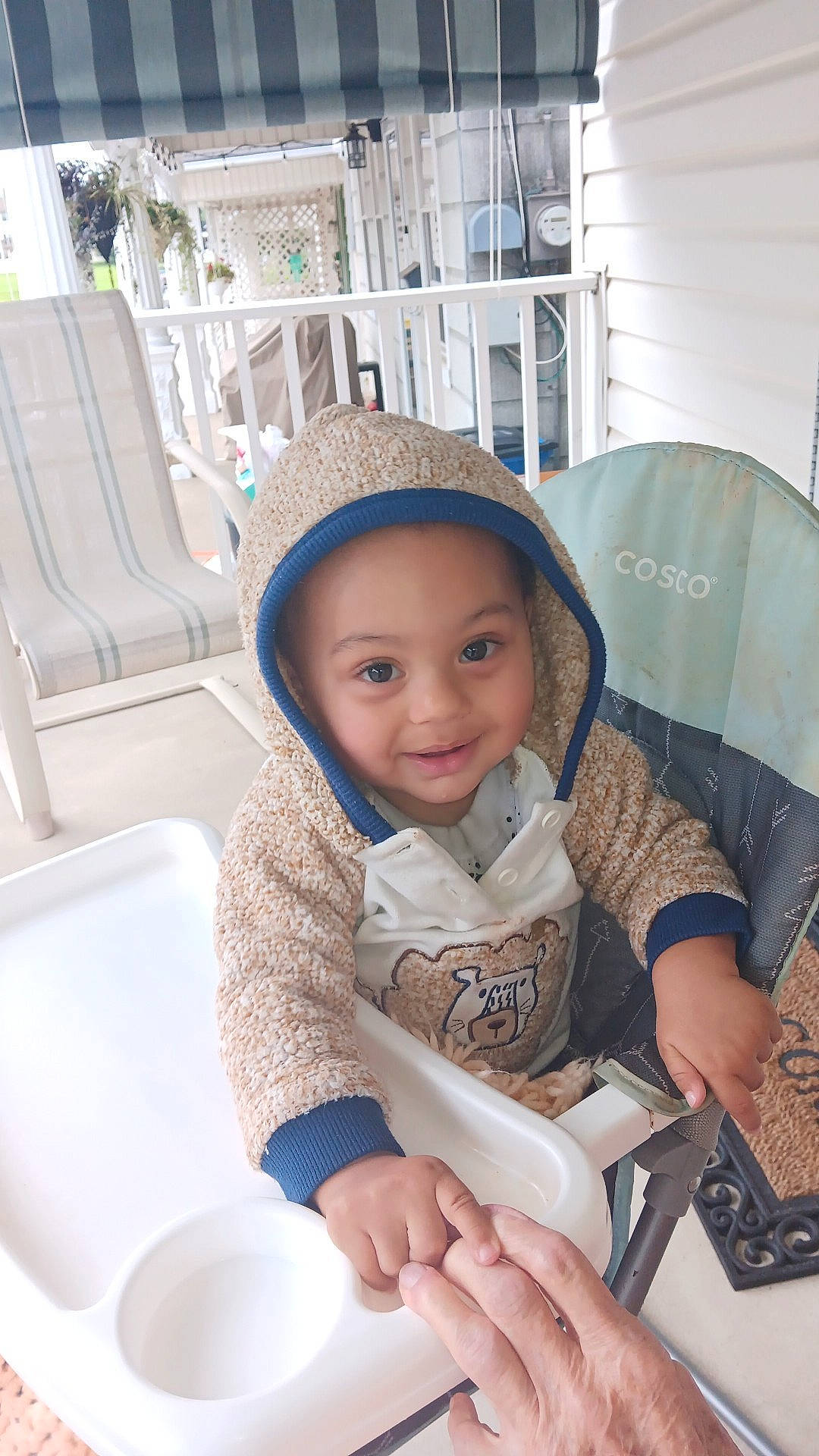 Jaziah is registered to the contest to win money with this photo: baby_toddler_clothing, cap, chair, child, comfort, dishware, fashion_accessory, fun, happy, hat, leisure, person, serveware, sitting, sleeve, smile, sun_hat, tableware, toddler, travel