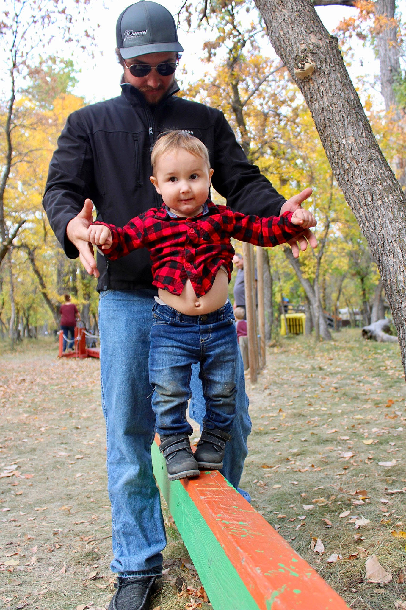 Hunter joined the competition — help win amazing prizes! baseball_cap, botany, cap, child, deciduous, fun, gesture, goggles, grass, happy, headwear, jeans, joy, leisure, people, people_in_nature, person, plant, recreation, smile