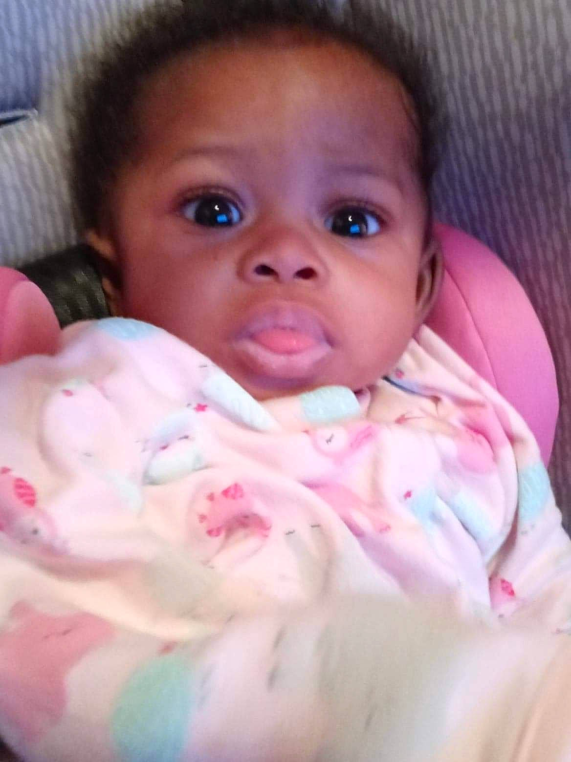 Italy is registered to the contest to win money with this photo: baby, baby_toddler_clothing, cheek, child, chin, comfort, eyebrow, eyelash, forehead, iris, lip, person, pink, skin, toddler