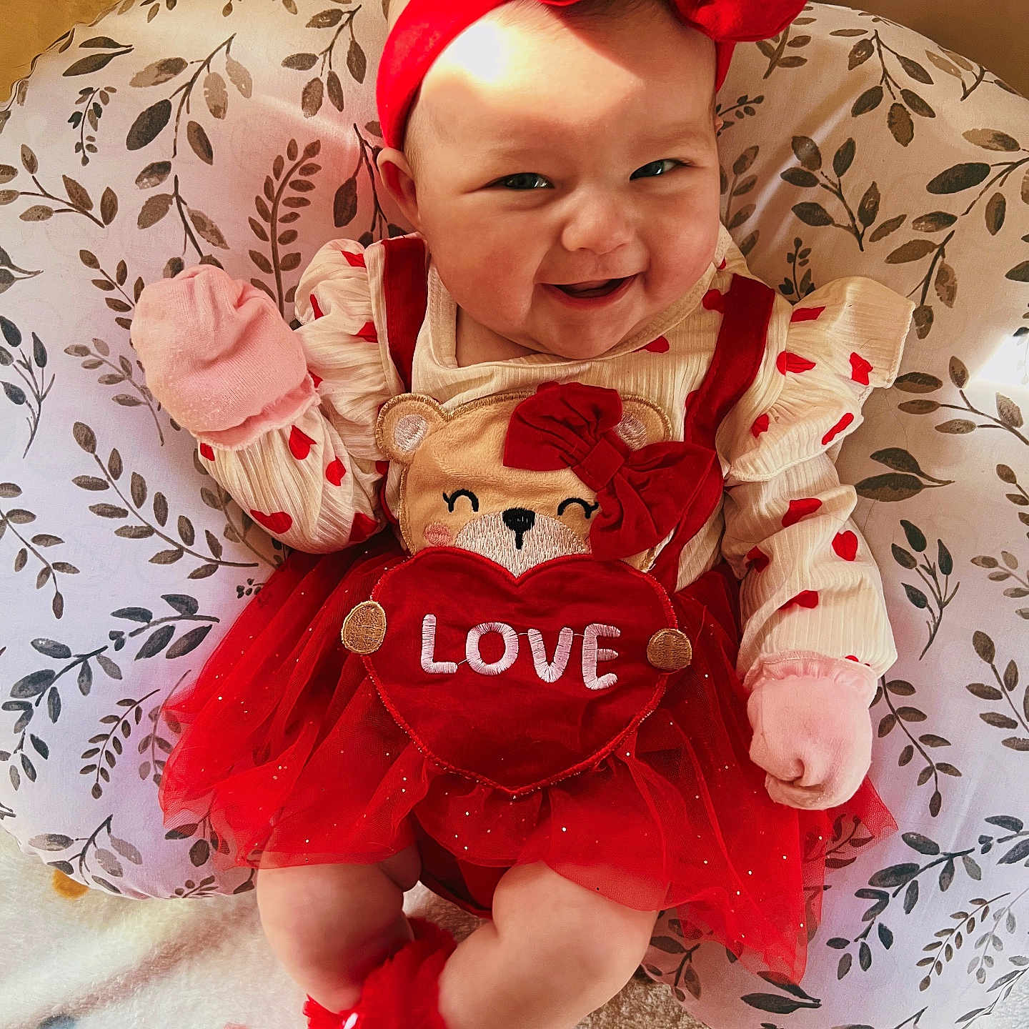Malorie joined the competition — help win amazing prizes! baby, babylaughing, clothing, costume, cushion, dress, face, furniture, happy, hat, head, homedecor, laughing, newborn, pants, person, photography, portrait, sitting, smile