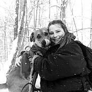 Bruce joined the competition — help win amazing prizes! animal, black_and_white, cold_weather, dog, forest, friendship, happy, hugging, human, leash, nature, outdoor, person, playful, smiling, snow, snowfall, trees, winter, winter_clothing