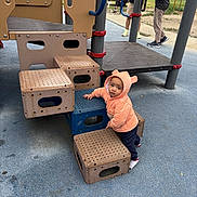 Zaki joined the competition — help win amazing prizes! toddler, child, playground, climbing, hoodie, outdoor, blocks, park, people, casual_clothing, footwear, grass, trees, conversation, daytime, curious, expression, play_equipment, recreation, fun