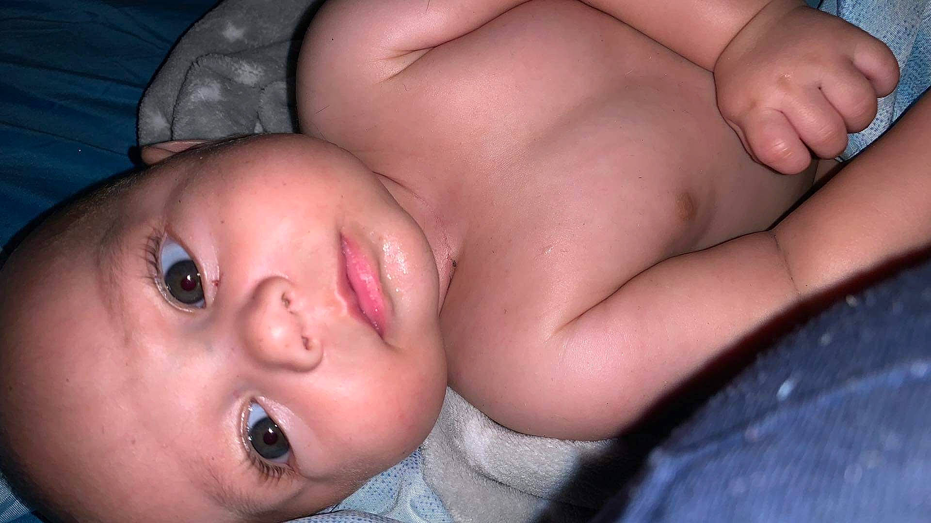 Nikolas is registered to the contest to win money with this photo: baby, black_hair, cheek, chest, child, close_up, comfort, eyelash, finger, flash_photography, hair, human, human_body, lip, mouth, muscle, nose, people, person, skin