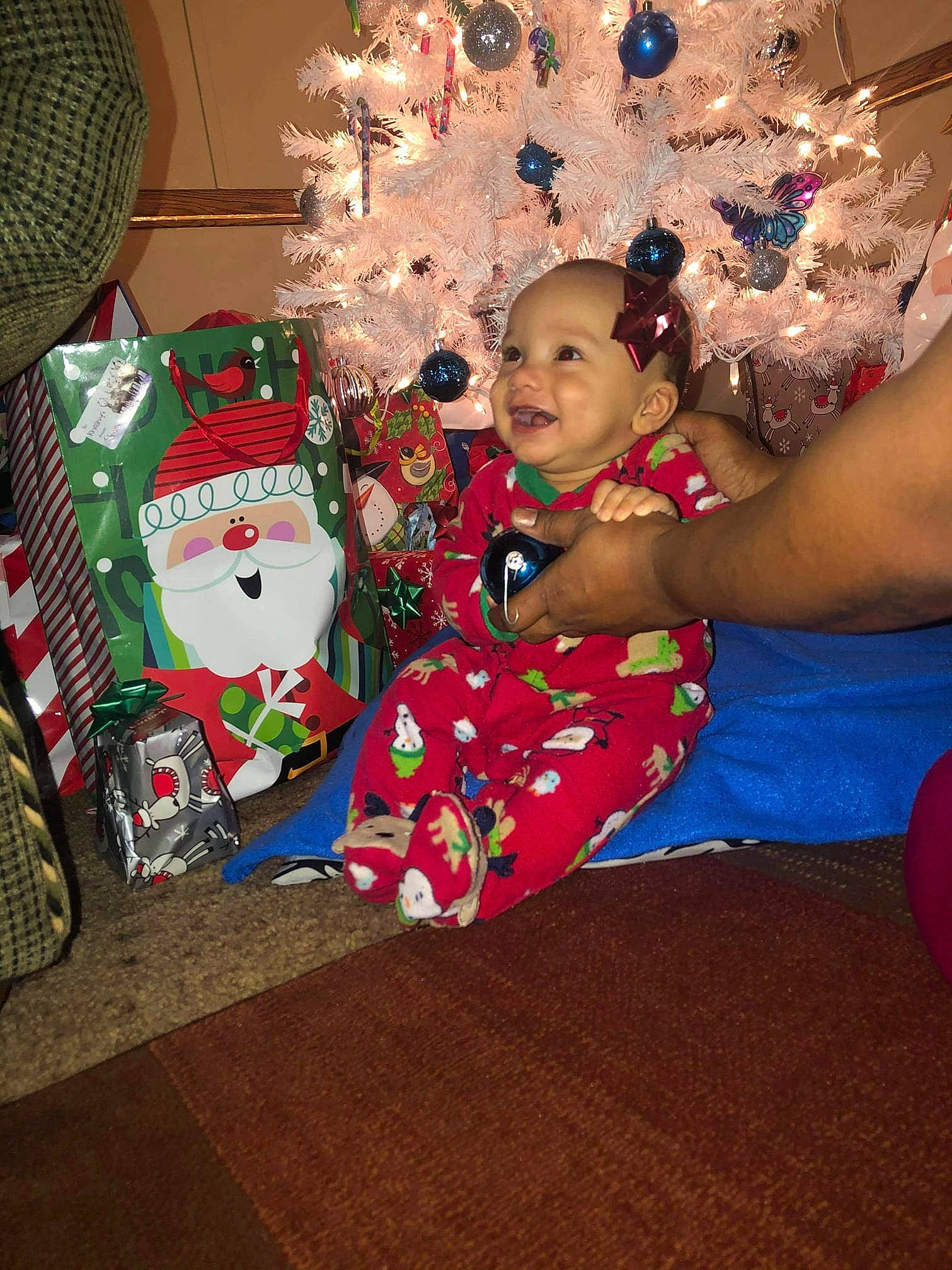 Chevy joined the competition — help win amazing prizes! balloon, carmine, christmas, christmas_decoration, christmas_eve, christmas_ornament, christmas_tree, event, fun, happy, holiday, holiday_ornament, lap, ornament, person, present, room, sitting, toddler, tradition