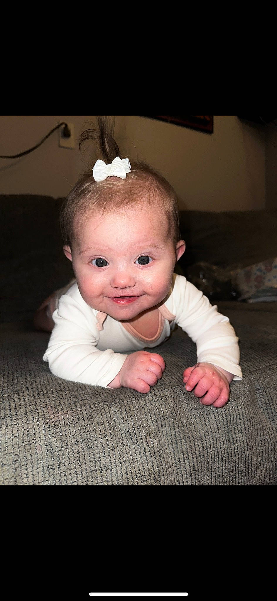 Lilly is registered to the contest to win money with this photo: baby, baby_toddler_clothing, cheek, child, comfort, eyebrow, flash_photography, flooring, fun, gesture, grass, happy, iris, lip, nose, person, sleeve, smile, thumb, toddler