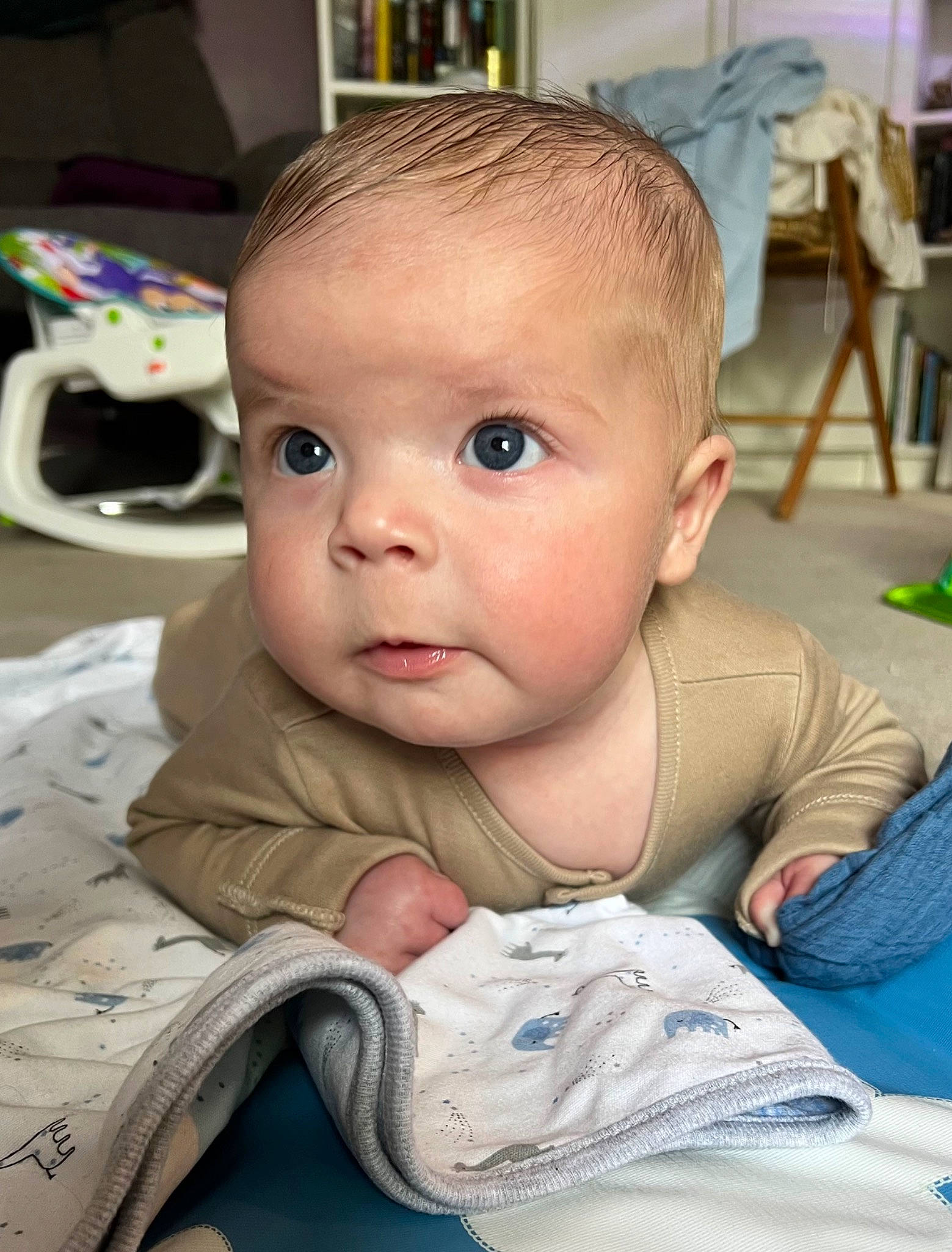 Alfie joined the competition — help win amazing prizes! baby, baby_products, baby_toddler_clothing, chair, cheek, child, comfort, ear, eyelash, flooring, fun, hairstyle, iris, mouth, nose, person, room, sitting, skin, smile