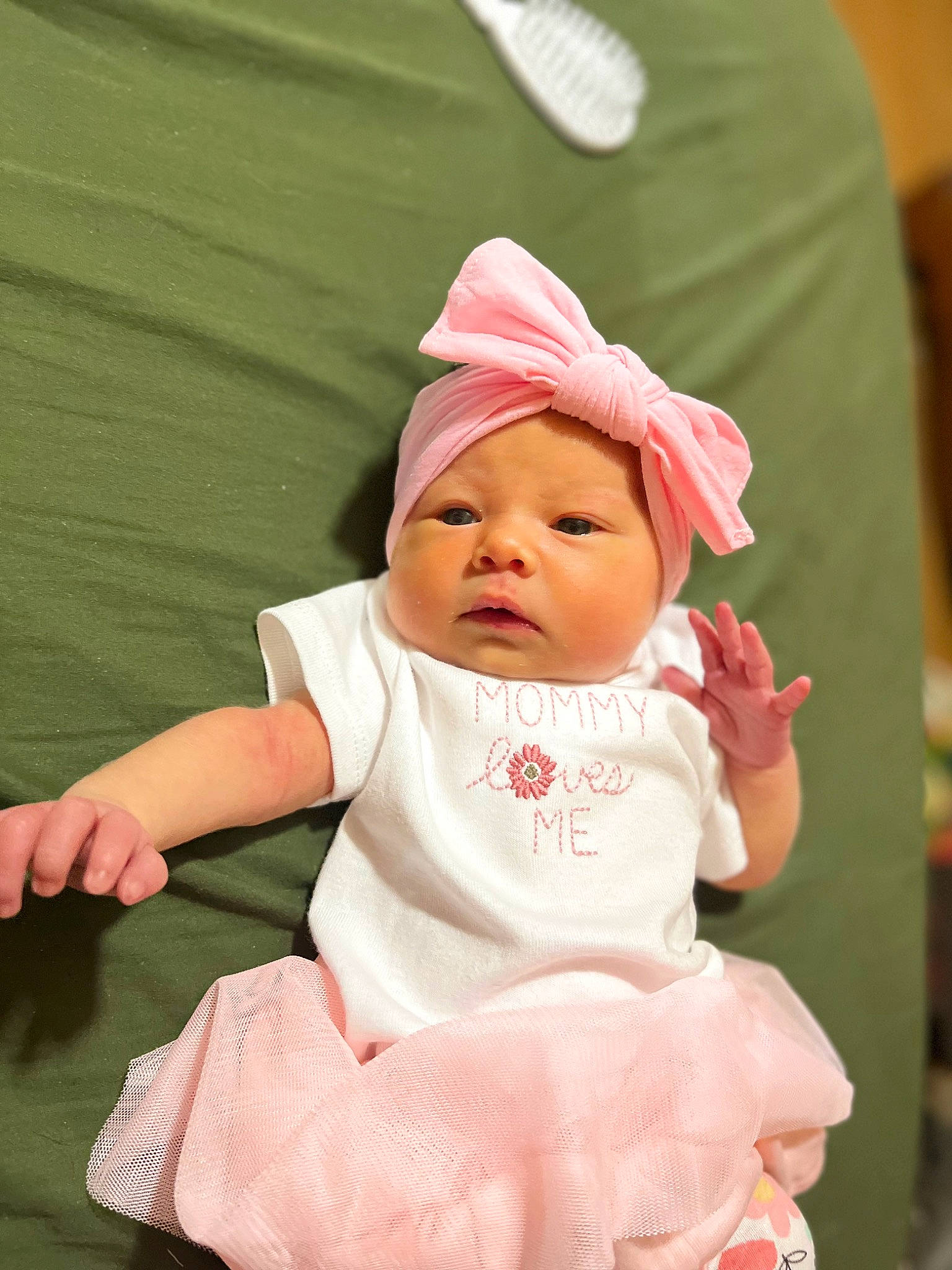 Aubreigh is registered to the contest to win money with this photo: baby, baby_products, baby_toddler_clothing, cap, cheek, child, comfort, event, fashion_accessory, foot, fun, grass, happy, hat, headwear, peach, person, pink, sitting, skin