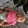 Haisley is registered to the contest to win money with this photo: baby, infant, pink_shirt, diaper, blanket, dog, black_dog, pet, sleeping_dog, tongue_out, cute, cozy, indoor, resting, friendship, playful, smiling, child, soft_texture, relaxation