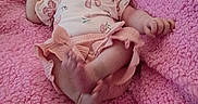 Oakie joined the competition — help win amazing prizes! baby, infant, child, portrait, lying_down, pink_blanket, floral_outfit, headband, bow, sleepy, face, hands, feet, crossed_legs, indoor, soft_blanket, close_up, adorable, baby_fashion, cozy